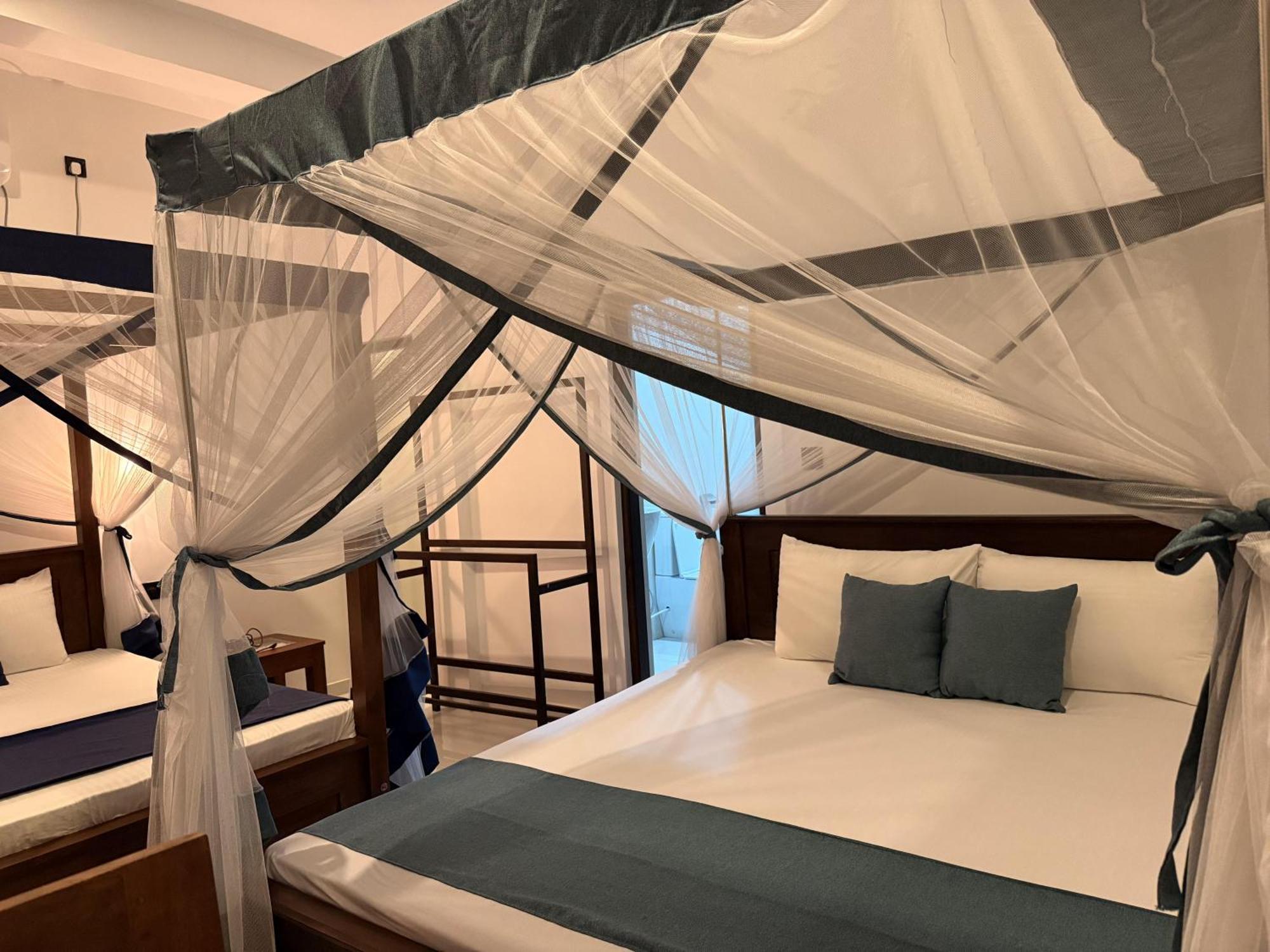Sea Bay Inn تانجالي المظهر الخارجي الصورة